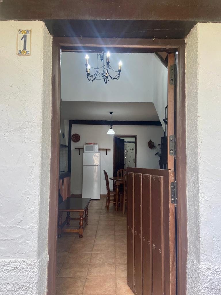img-casa1-9 Imagen de la puerta de entrada de la casa 1